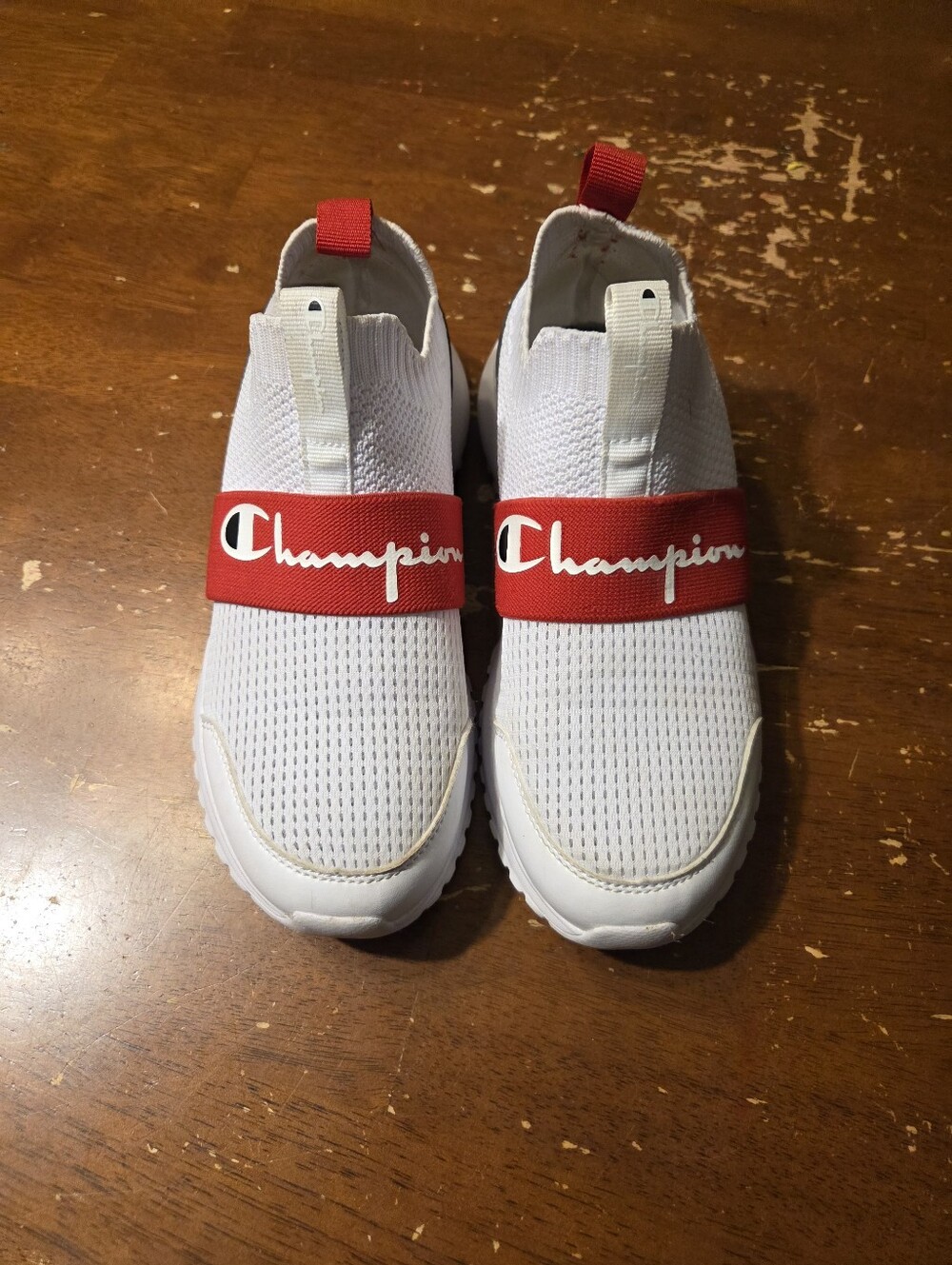 Champion White Slip-On Sneakers with Red Logo Band